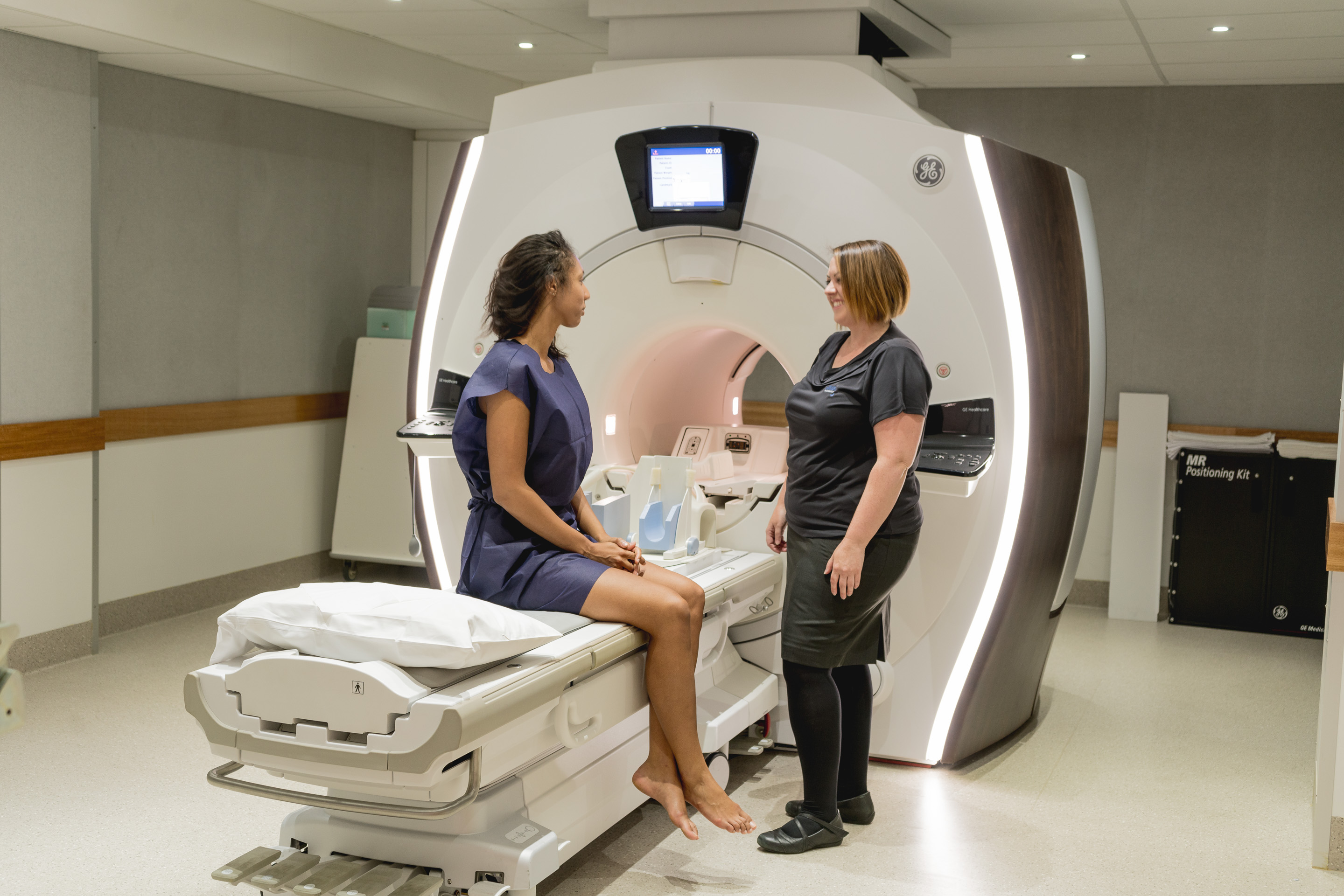 Doctor Doing MRI Procedure on a Female Patient | Xray & MRI Specialist | Fowler Simmons Radiology