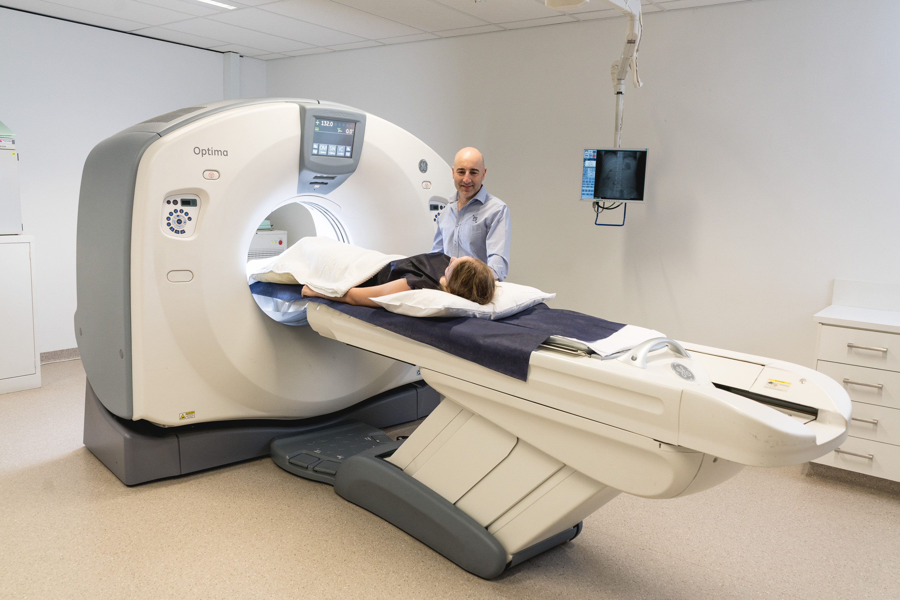 Doctor Performs MRI Procedure on Patient | Ultrasound Services Near Me | Fowler Simmons Radiology